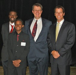  Dreamer mentor Marius Finch, left, with dreamer and event co-host Hayelom Fitsum, Foundation Treasurer David Simon and Rusty Wehner, foundation president
